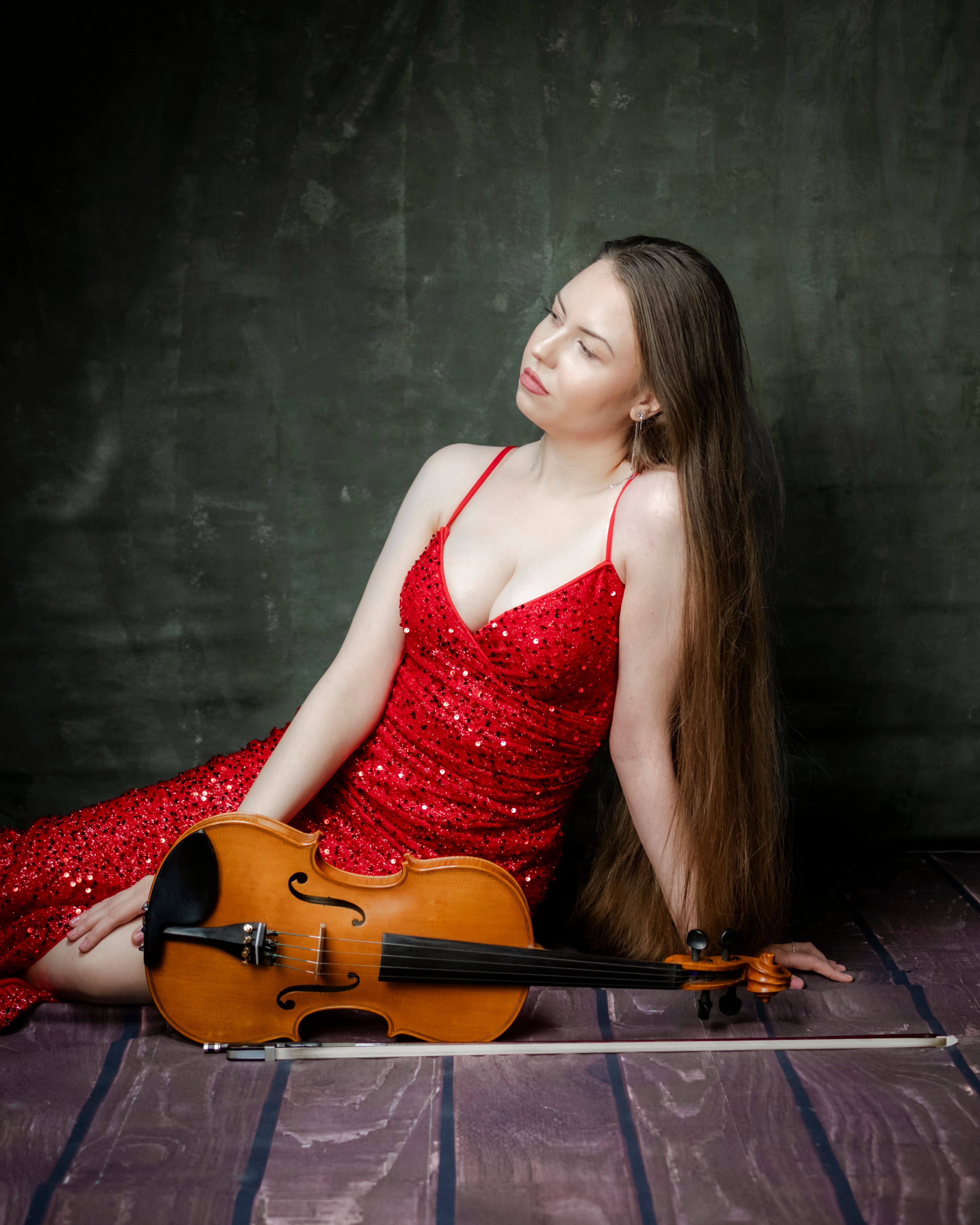 The Sistrings duo posing elegantly with violin and viola